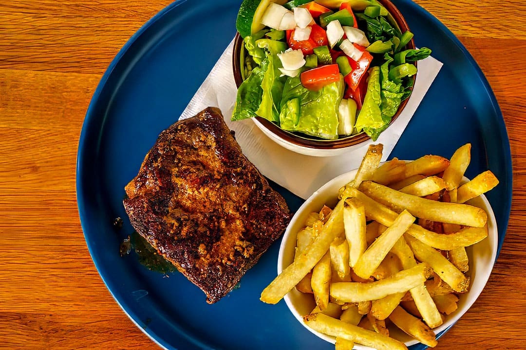 Flat iron sirloin entree from Snakes & Lattes Tucson